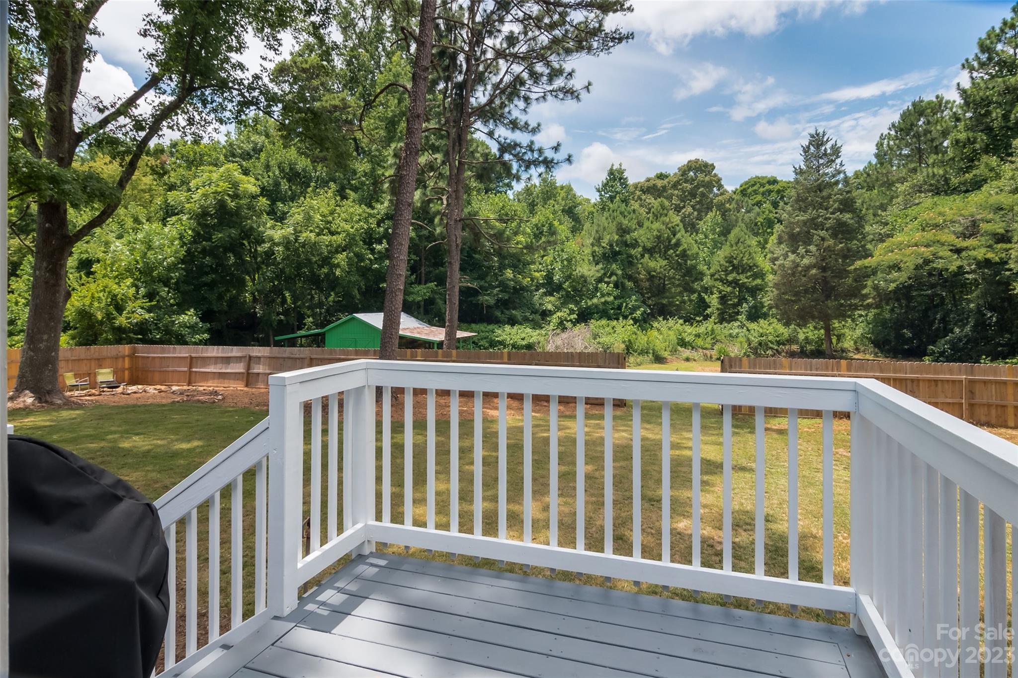 2901 Oakdale Road Charlotte, NC 28216 - Photo 33 of 48 a view of deck and trees