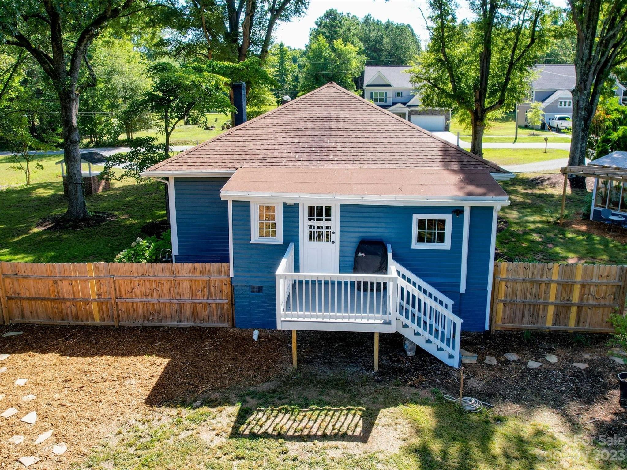 2901 Oakdale Road Charlotte, NC 28216 - Photo 42 of 48 a front view of a house with a garden
