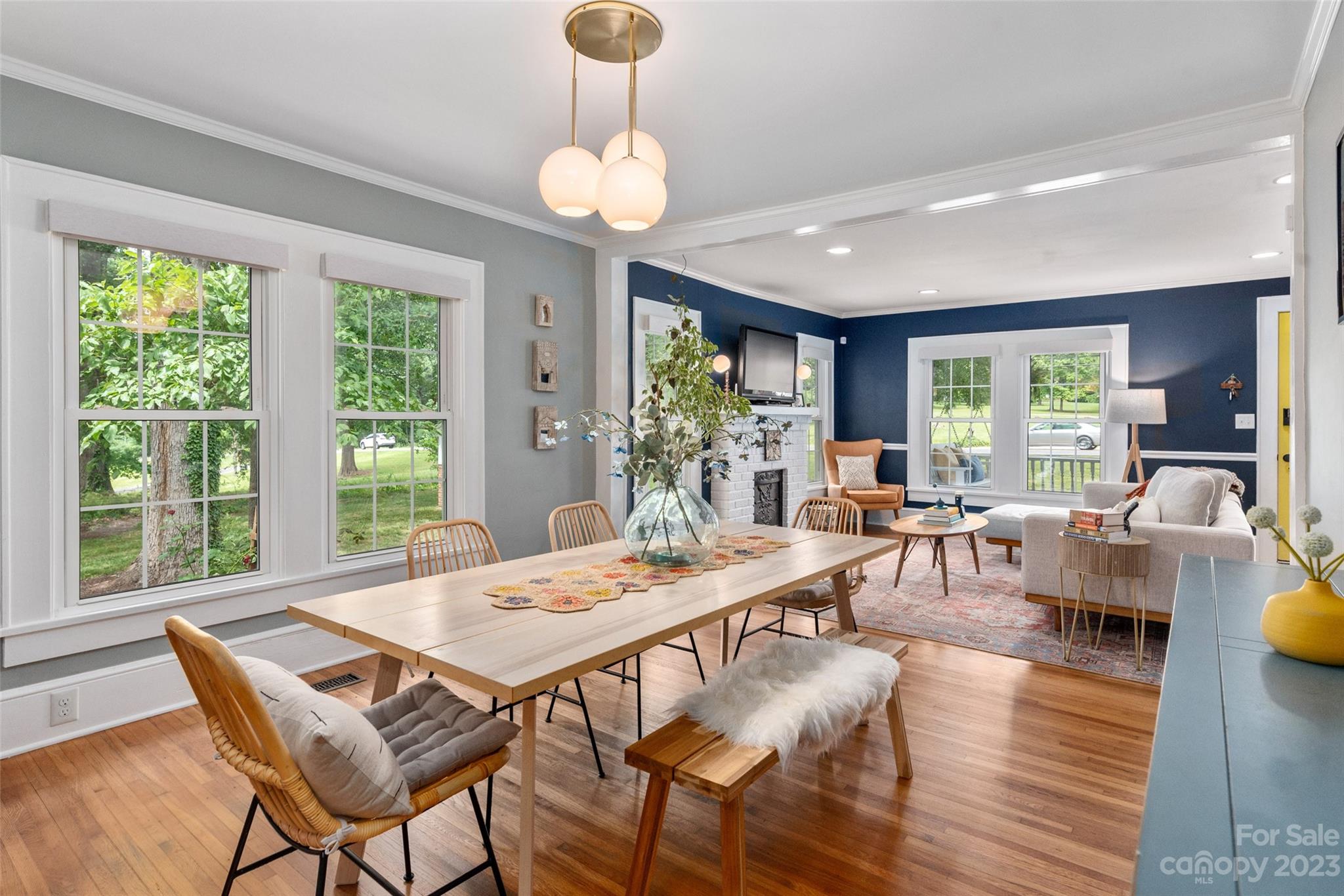 2901 Oakdale Road Charlotte, NC 28216 - Photo 10 of 48 a view of a dining room with furniture window and wooden floor