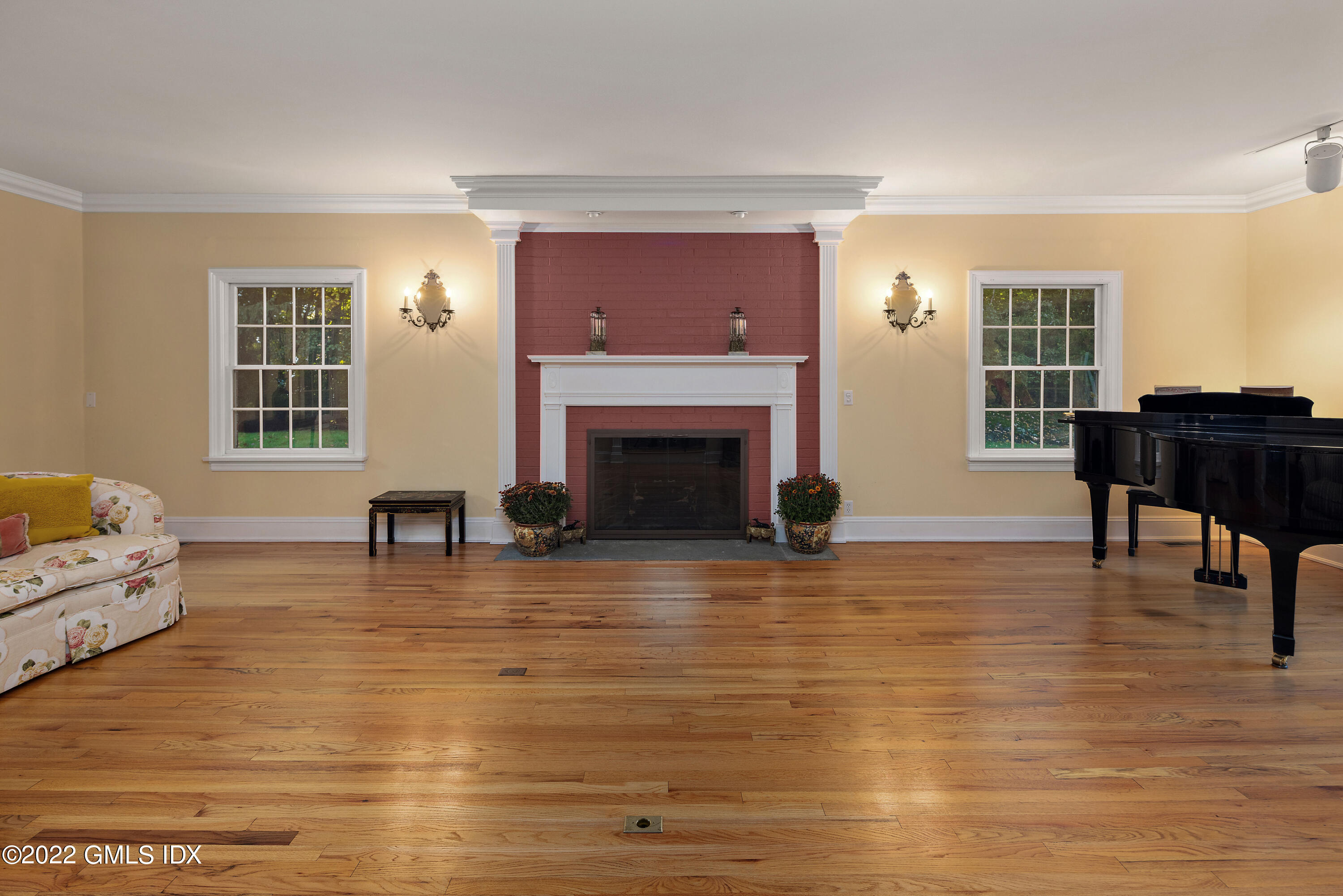 42 Angus Lane Greenwich, CT 06831 - Photo 11 of 39 a living room with furniture and a fireplace