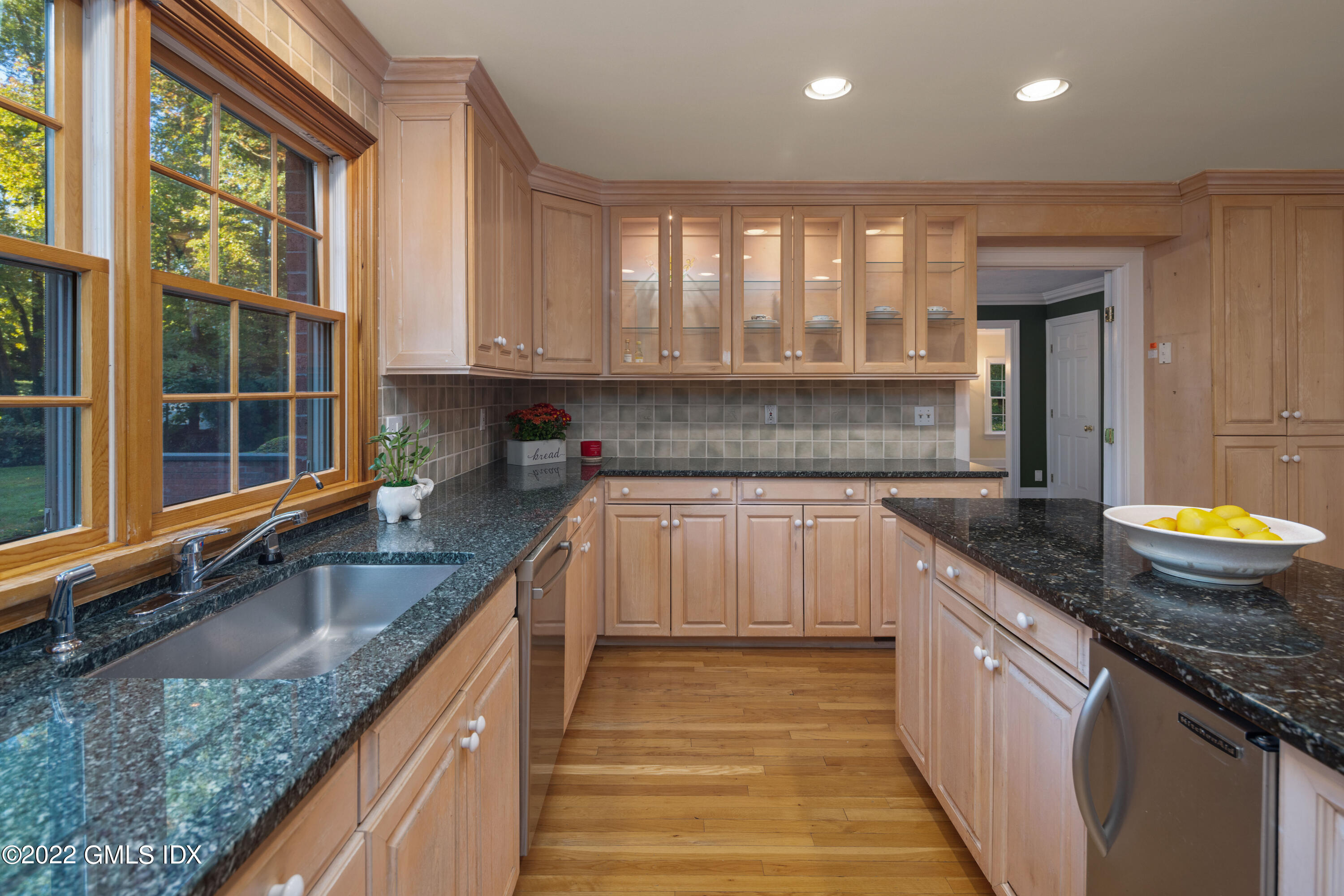 42 Angus Lane Greenwich, CT 06831 - Photo 14 of 39 a kitchen with granite countertop a sink a counter top space and cabinets