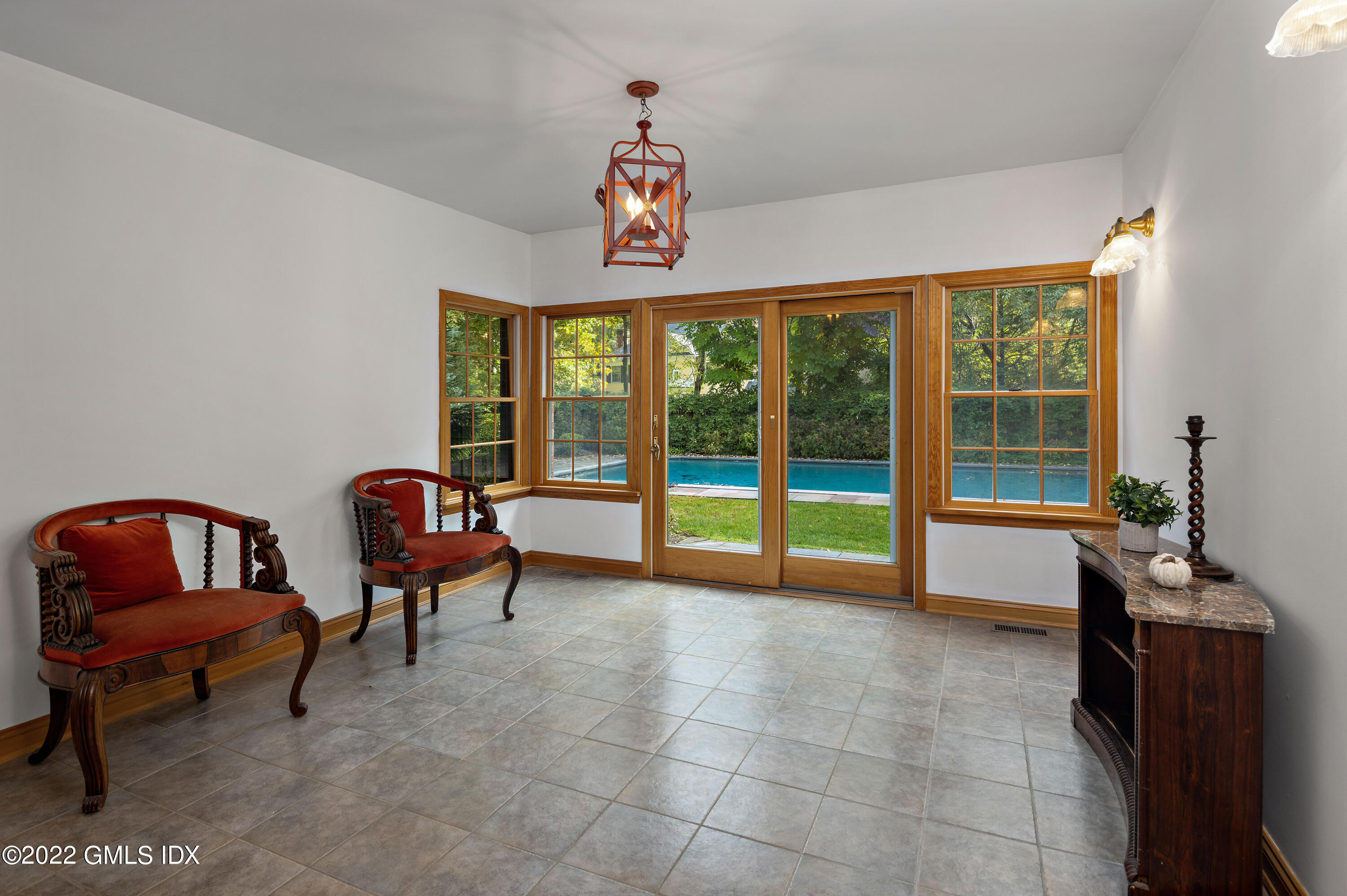 42 Angus Lane Greenwich, CT 06831 - Photo 16 of 39 a living room with furniture and a window