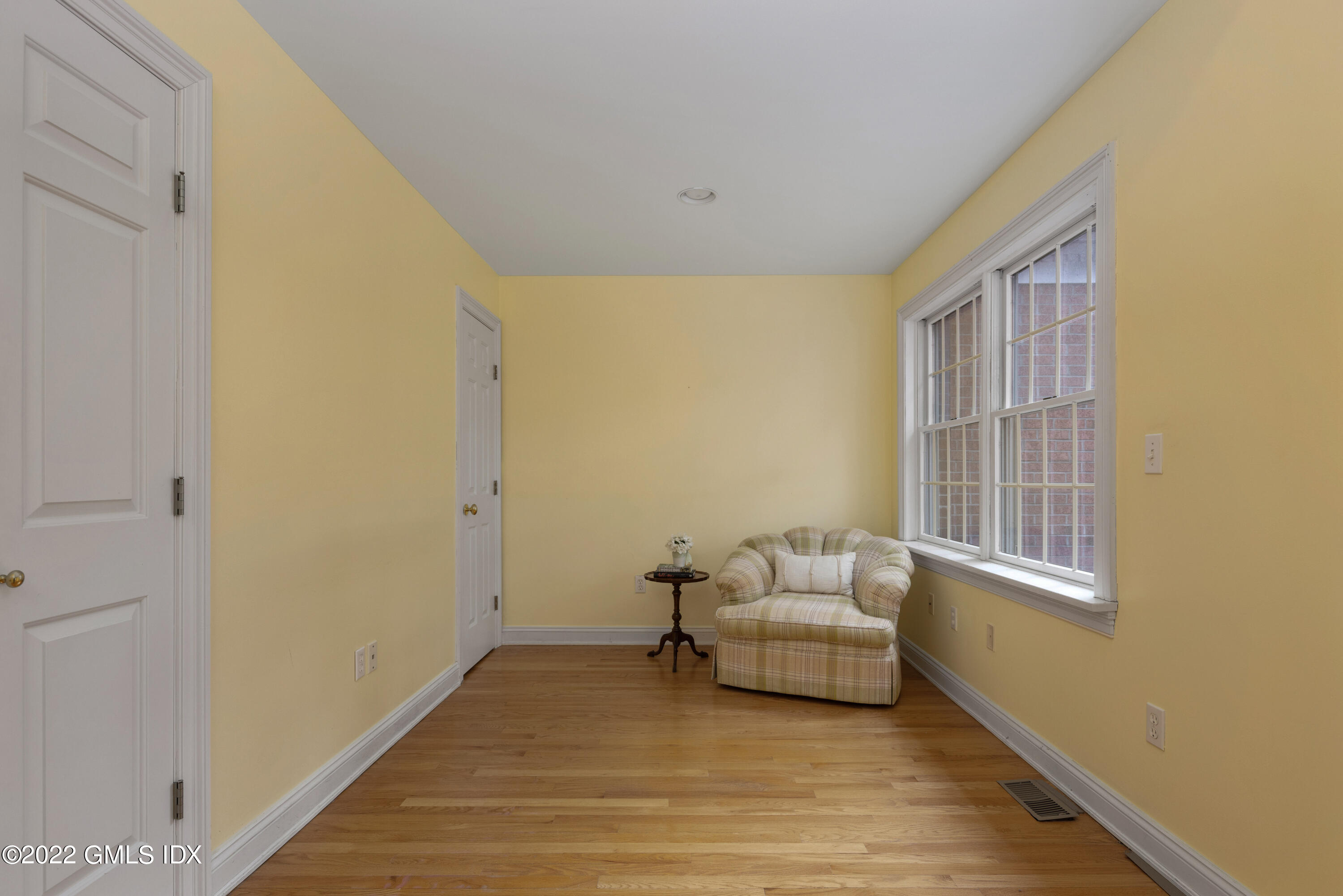 42 Angus Lane Greenwich, CT 06831 - Photo 23 of 39 a living room with furniture and a window