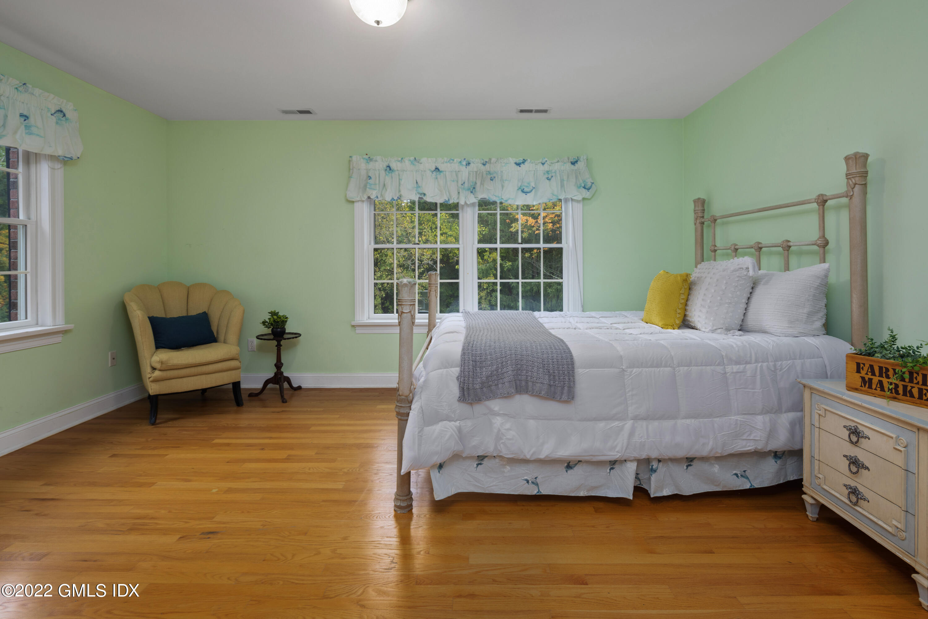 42 Angus Lane Greenwich, CT 06831 - Photo 29 of 39 a bedroom with a bed chair and a window