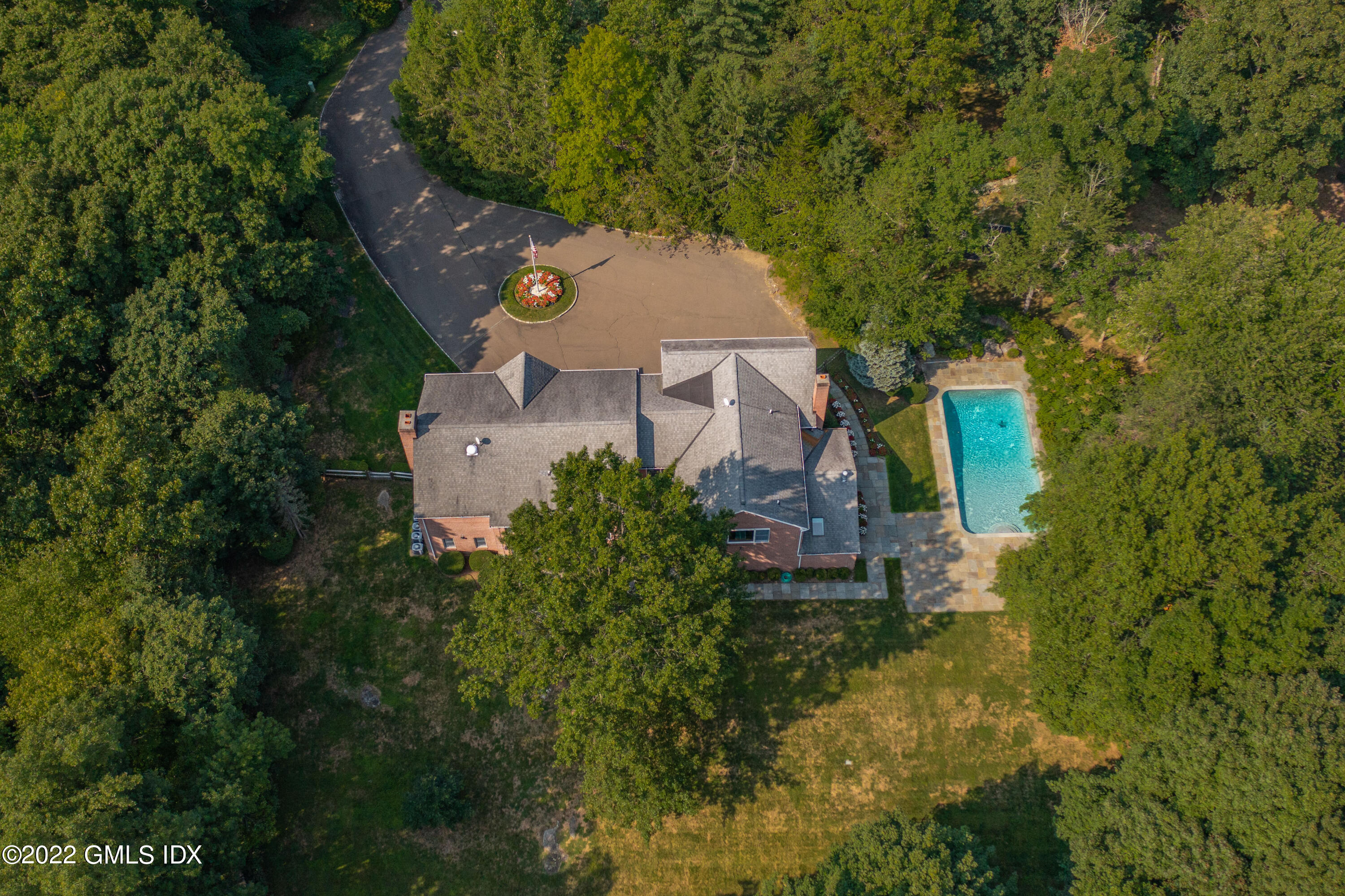 42 Angus Lane Greenwich, CT 06831 - Photo 3 of 39 an aerial view of a house with a yard
