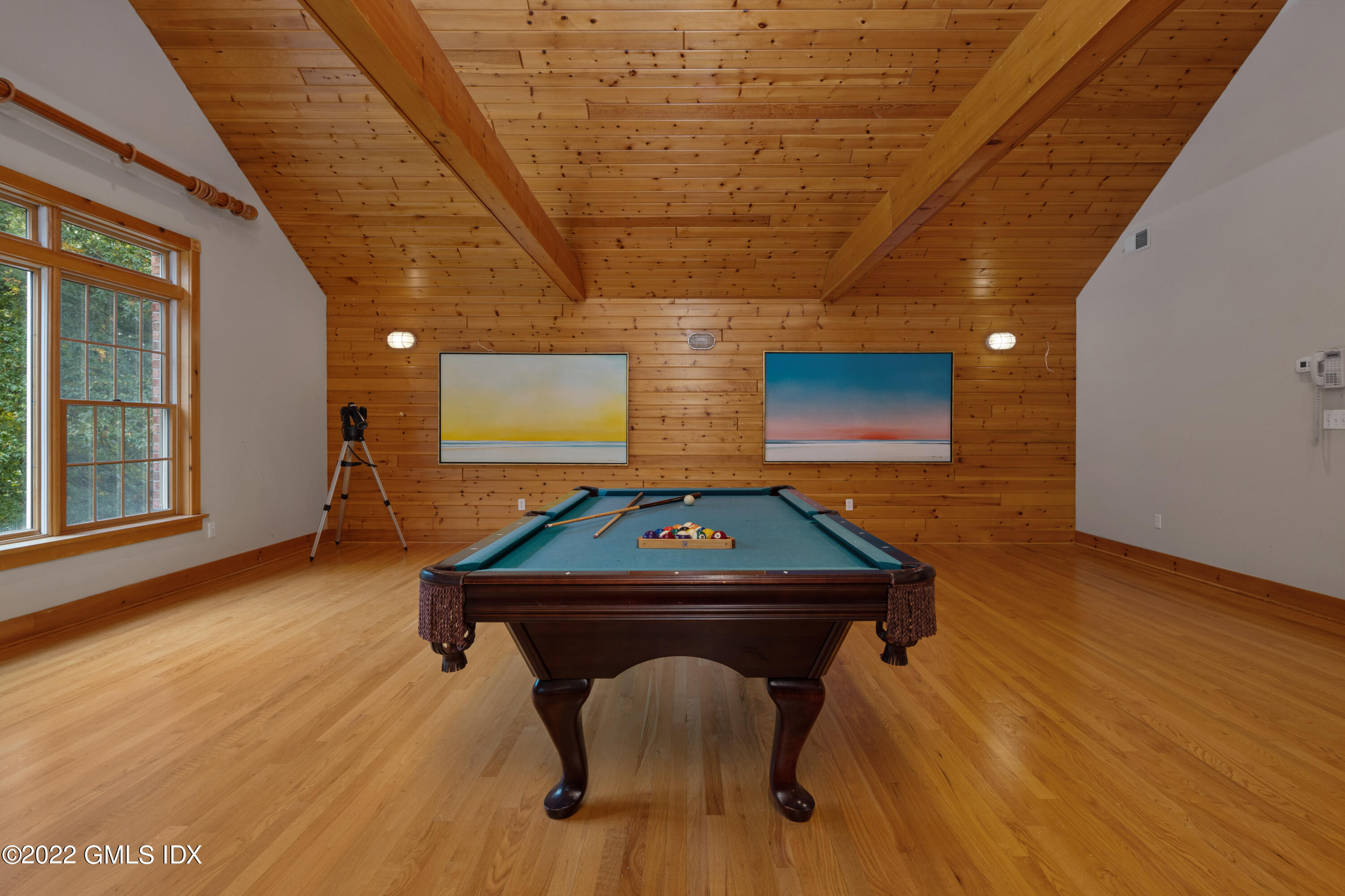 42 Angus Lane Greenwich, CT 06831 - Photo 32 of 39 a room with furniture and wooden floor