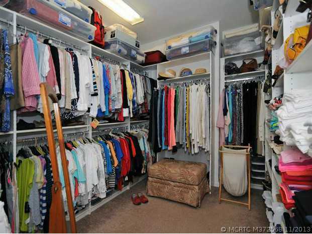 134 Southwest Walking Path Stuart, FL 34997 - Photo 15 of 25 Other. Master Bedroom ClosetMaster Bedroom Closet- This is a "Dream" closet!!! custom adjustable built -in shelving, abundant storage, upgraded carpeting! Must see!