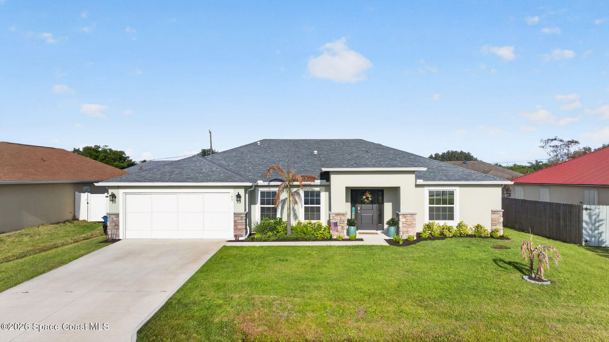 145 Benchor Road Northwest Palm Bay, FL 32907 - Photo 2 of 41 Front of Home