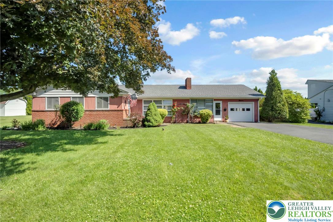 13 Ridgewood Road Easton, PA 18045 - Photo 1 of 32 Well-maintained ranch-style home featuring a neat lawn and mature landscaping.