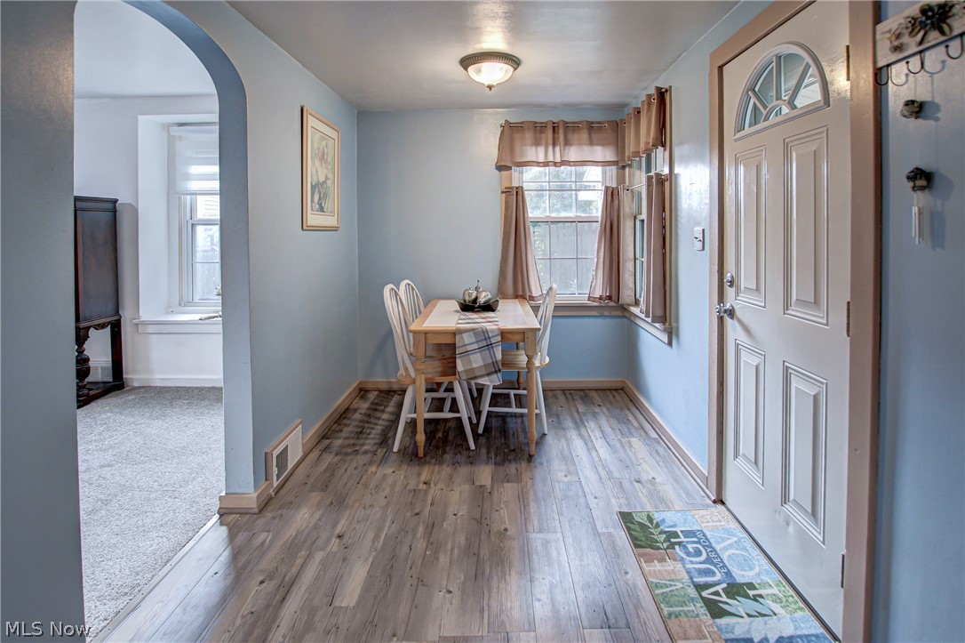 688 Wooster Road North Barberton, OH 44203 - Photo 9 of 47 Dining Room and entry way featuring light wood-type flooring