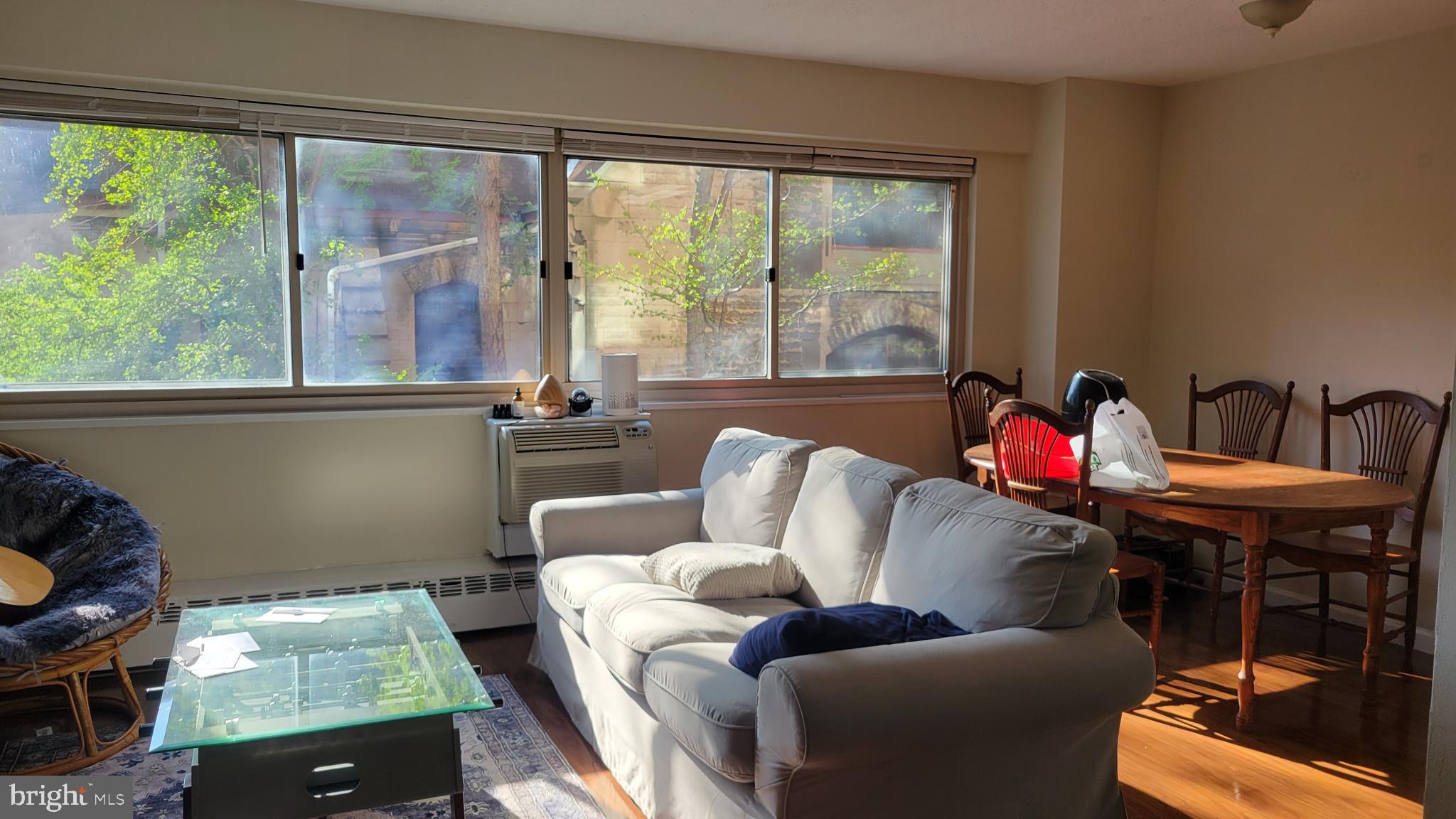 a living room with furniture and a window
