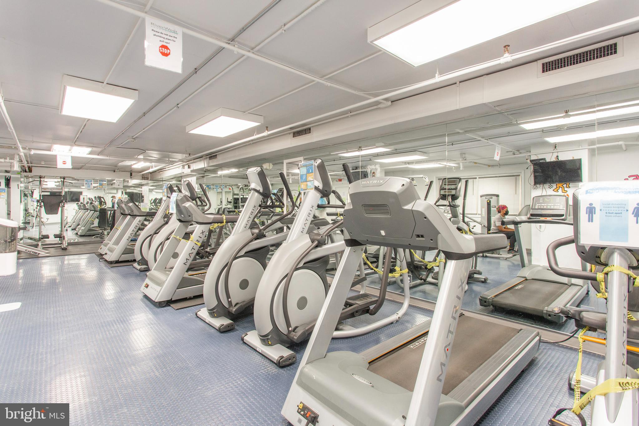 2101-17 Chestnut Street, Unit 215 Philadelphia, PA 19103 - Photo 6 of 10 a view of a room with gym equipment
