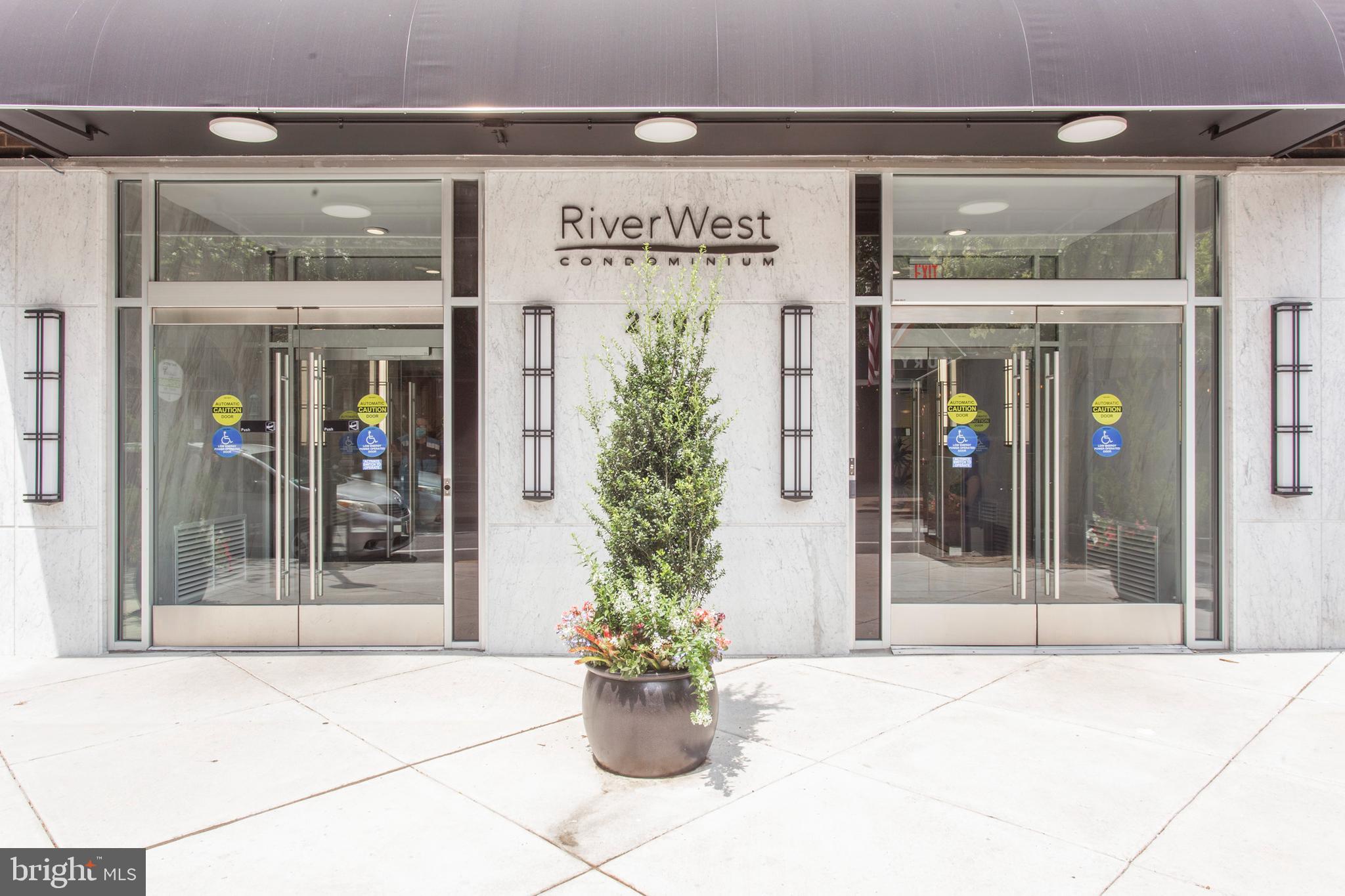 2101-17 Chestnut Street, Unit 215 Philadelphia, PA 19103 - Photo 9 of 10 a potted plant sitting in front of a building