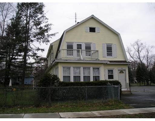 1996 Westfield Street West Springfield, MA 01089 - Photo 4 of 15 a front view of a house with a yard
