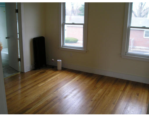 1996 Westfield Street West Springfield, MA 01089 - Photo 8 of 15 a view of a room with wooden floor and a window