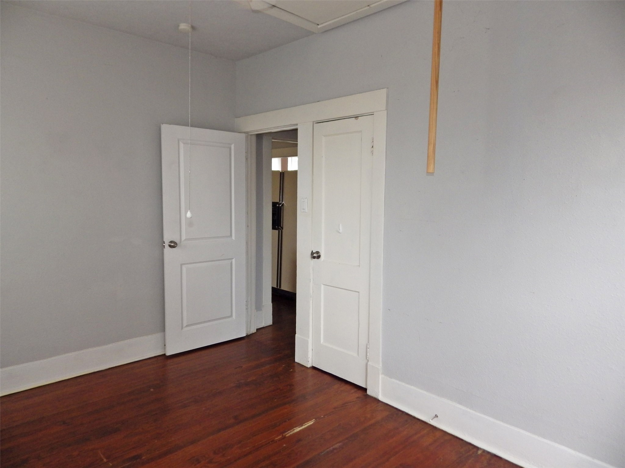 4322 Wilmer Street Houston, TX 77003 - Photo 14 of 31 a view of an empty room with wooden floor