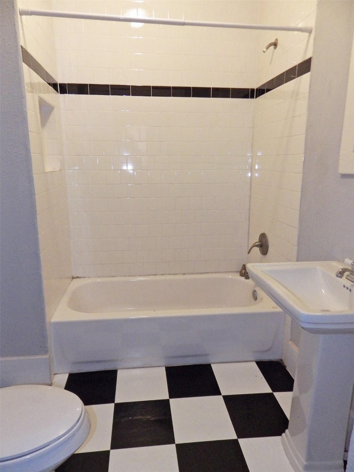 4322 Wilmer Street Houston, TX 77003 - Photo 21 of 31 a bathroom with a bathtub and a shower