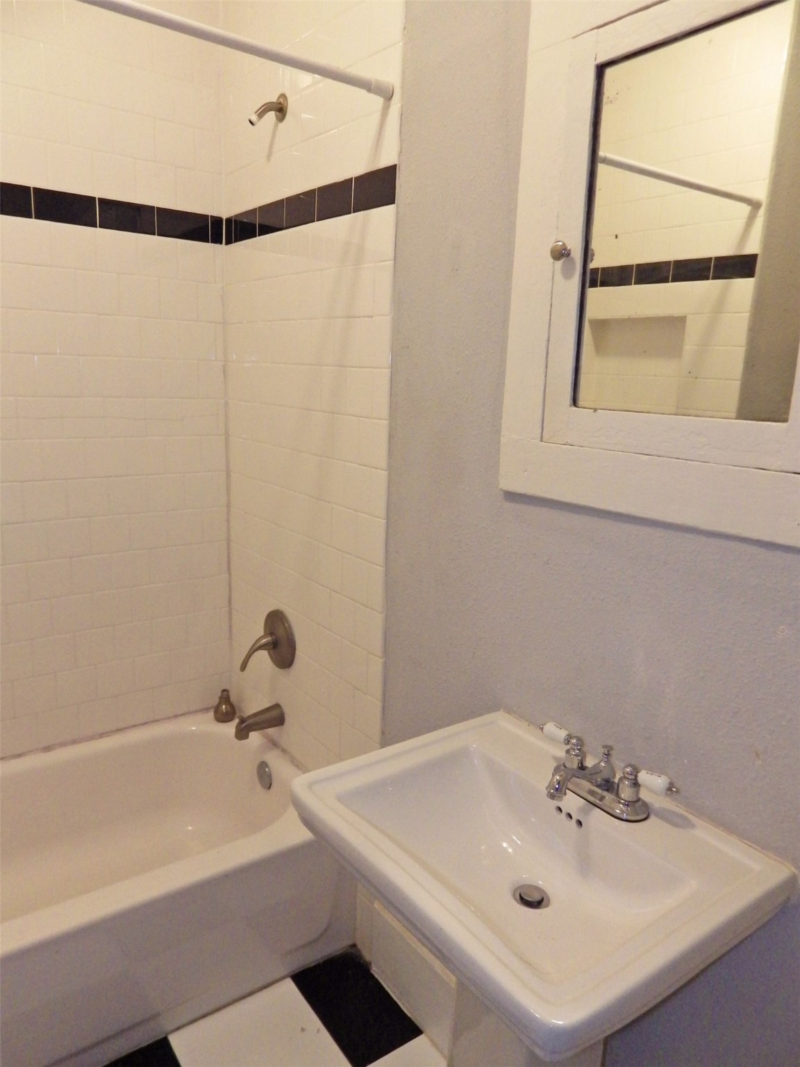 4322 Wilmer Street Houston, TX 77003 - Photo 22 of 31 a bathroom with a sink and a window