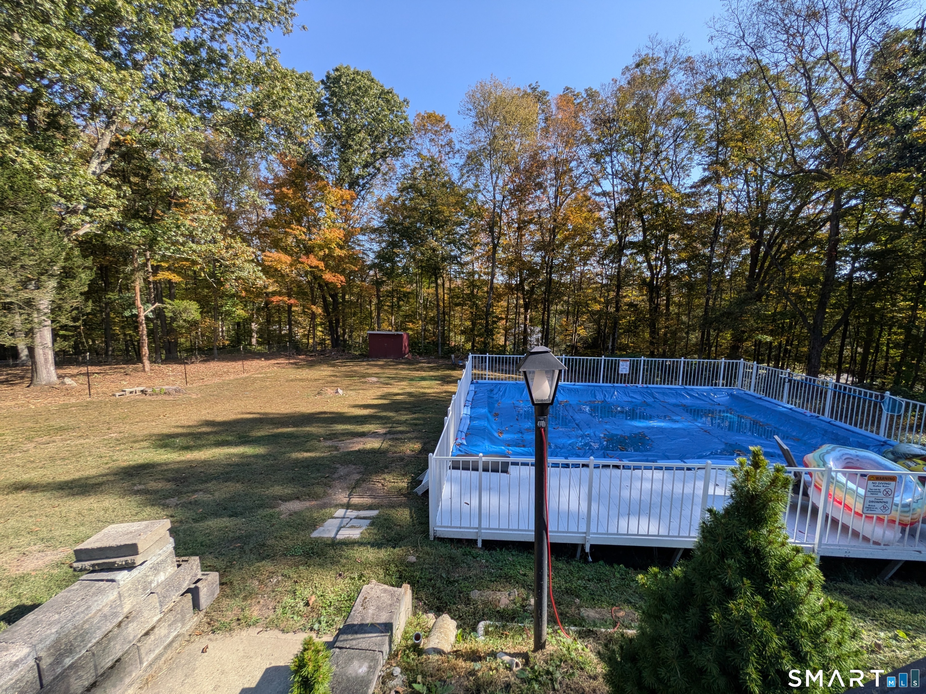 30 Fairfield Road Oxford, CT 06478 - Photo 28 of 29 a view of a swimming pool with a patio