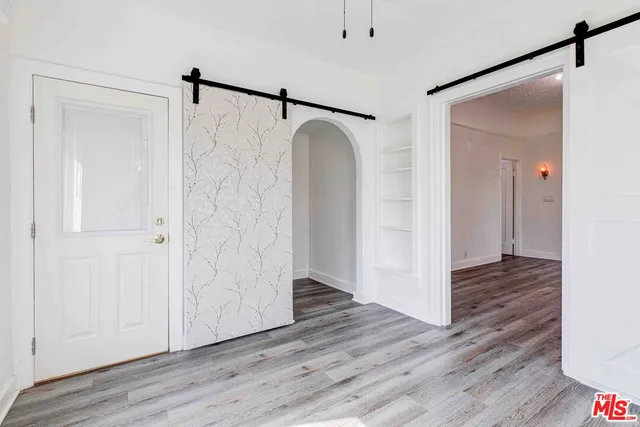 a view of bathroom with wooden floor