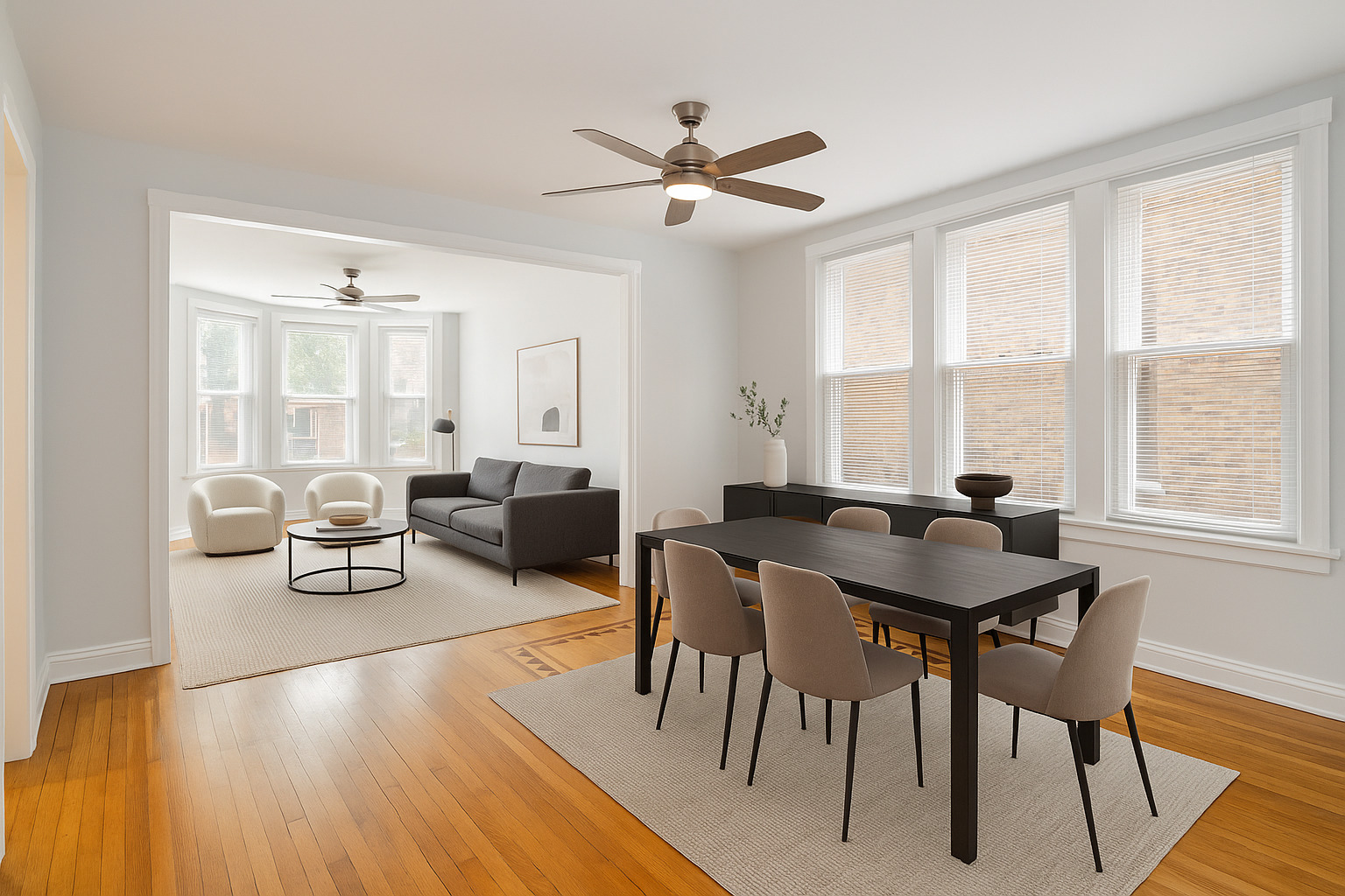 4247 West Melrose Street, Unit 1 Chicago, IL 60641 - Photo 3 of 6 a view of a dining room with furniture and a large window