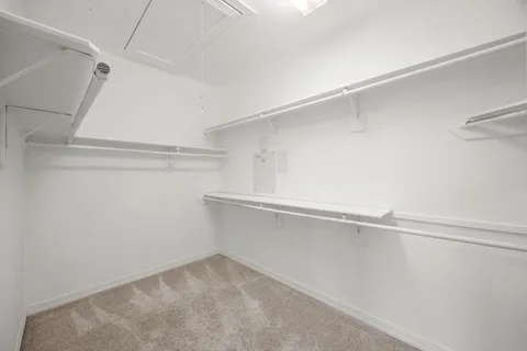 a bathroom with a sink a toilet a mirror and bathtub