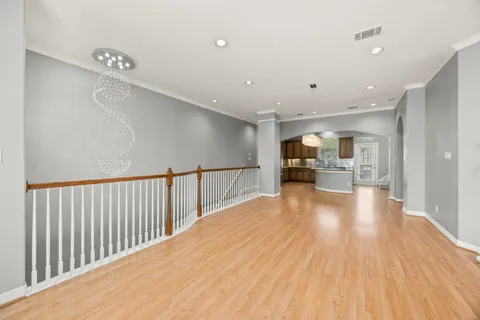a kitchen with a refrigerator and a sink