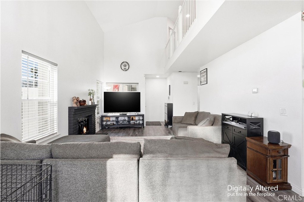 7639 Hillhurst Drive Riverside, CA 92508 - Photo 13 of 60 a living room with furniture and a flat screen tv