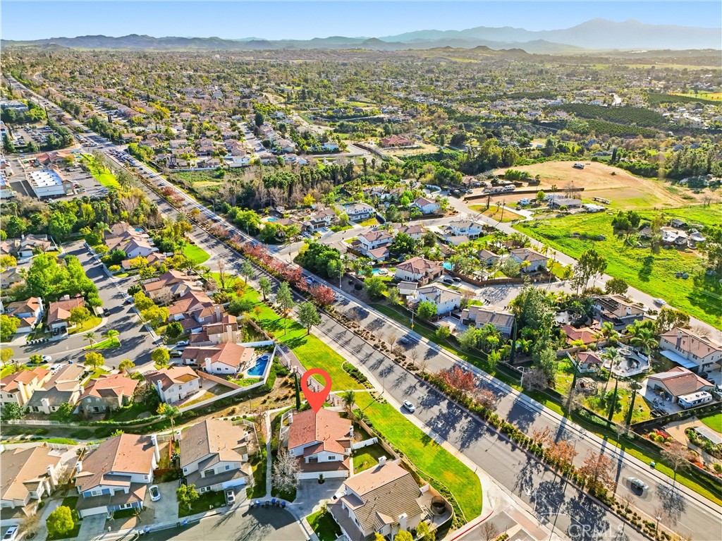 7639 Hillhurst Drive Riverside, CA 92508 - Photo 54 of 60 an aerial view of residential houses with outdoor space