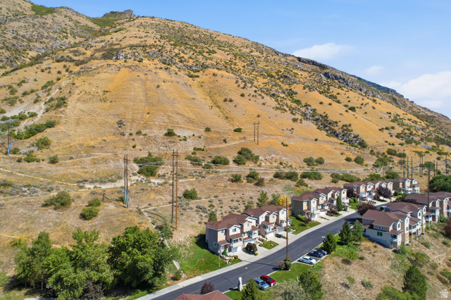 1305 Alpine Way Provo, UT 84606 - Photo 46 of 56 Residential community with multi-story townhomes and a paved roadway