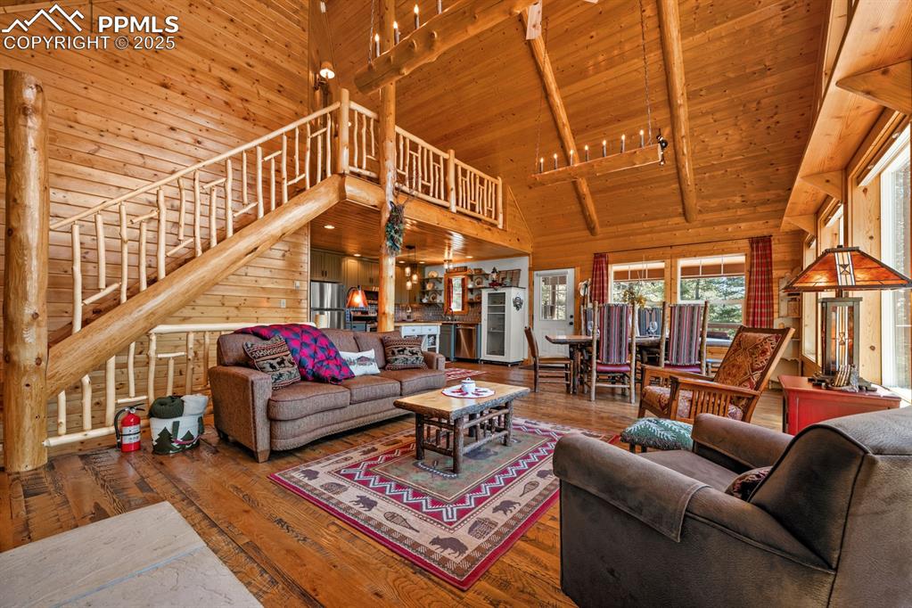 163 Wonder Trail Rye, CO 81069 - Photo 16 of 50 a living room with furniture a couch and wooden floor