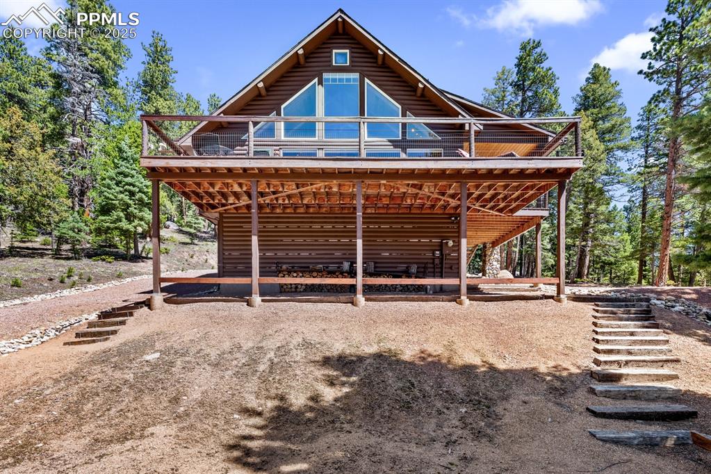 163 Wonder Trail Rye, CO 81069 - Photo 2 of 50 a front view of a house with a yard