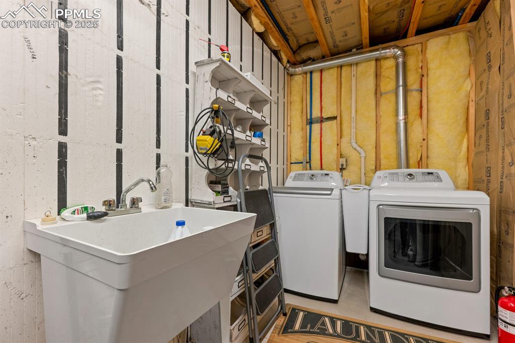 163 Wonder Trail Rye, CO 81069 - Photo 41 of 50 a utility room with dryer and washer
