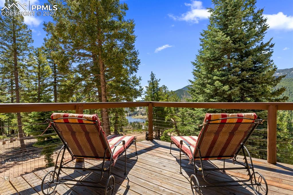 163 Wonder Trail Rye, CO 81069 - Photo 46 of 50 a view of a chair and table on the deck