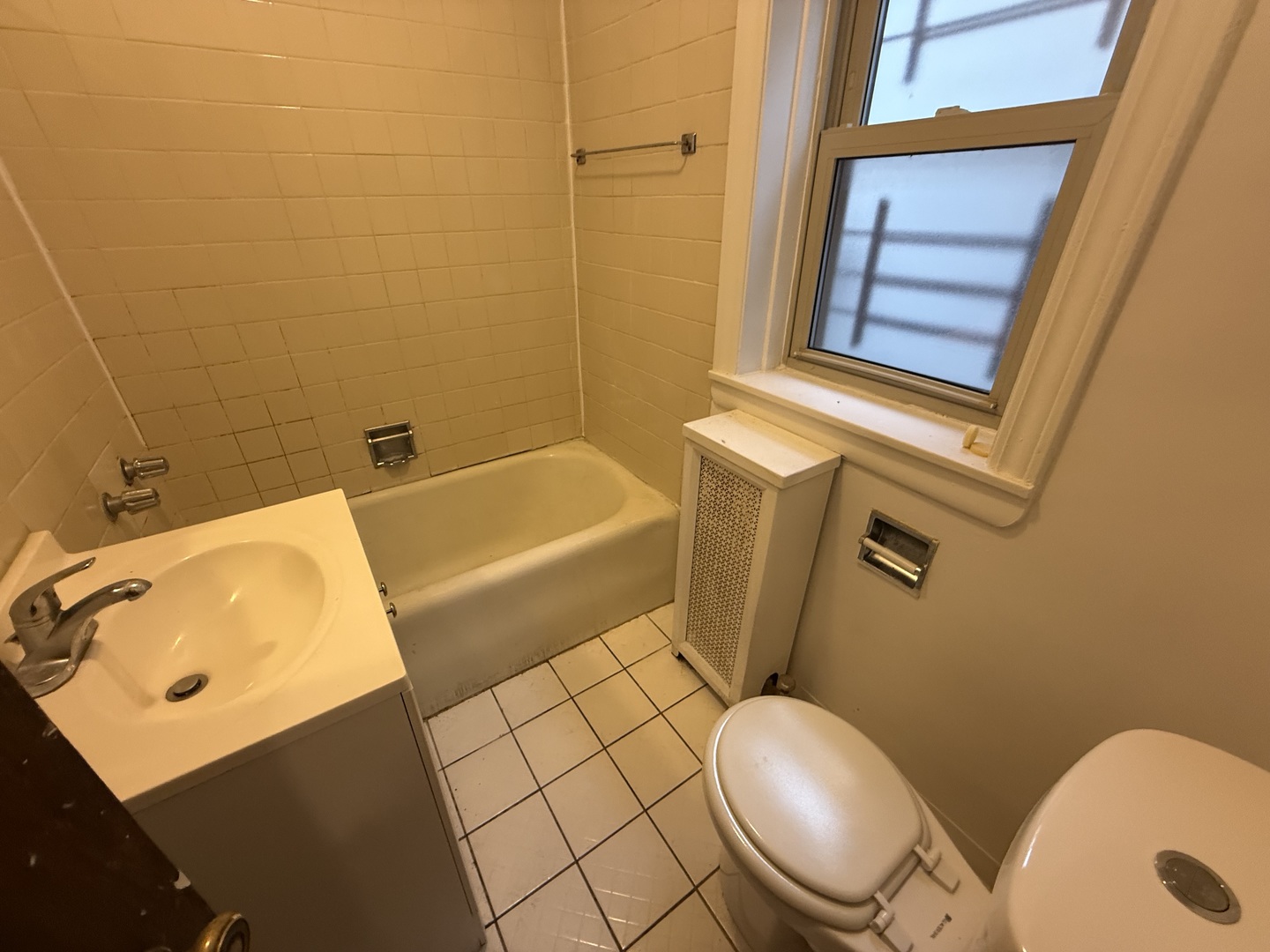 3152 North Linder Avenue, Unit 1 Chicago, IL 60641 - Photo 10 of 12 a bathroom with a sink and a toilet