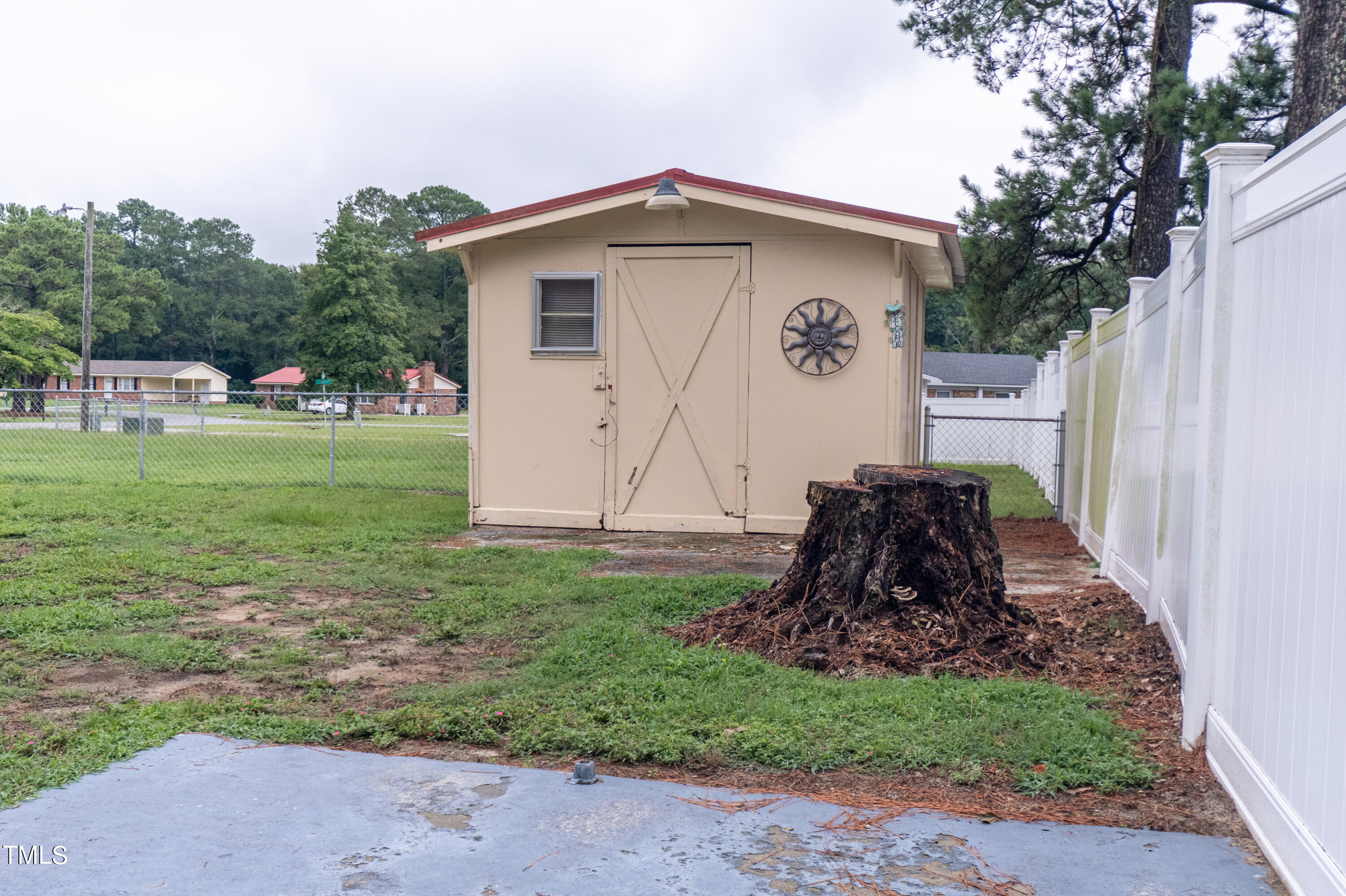 222 Rollingwood Drive Dudley, NC 28333 - Photo 14 of 14 a front view of a house with garden