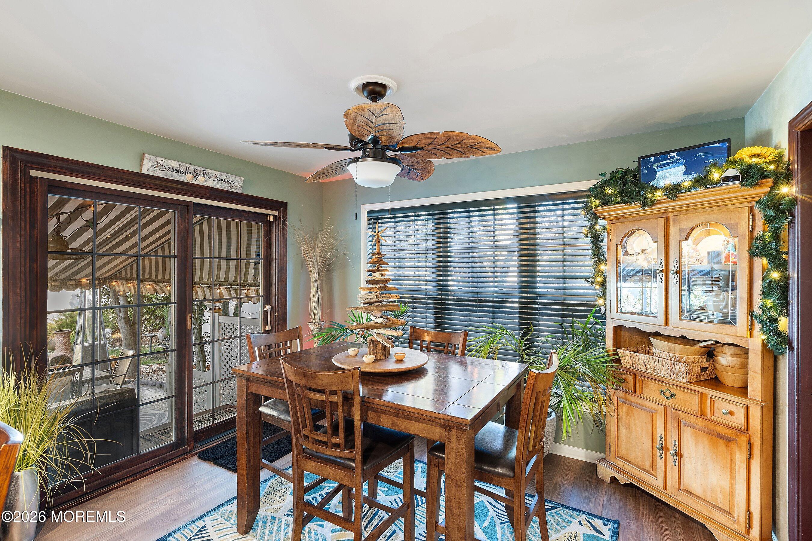 648 Point Avenue Brick, NJ 08724 - Photo 11 of 40 a view of a dining room with furniture window and outside view