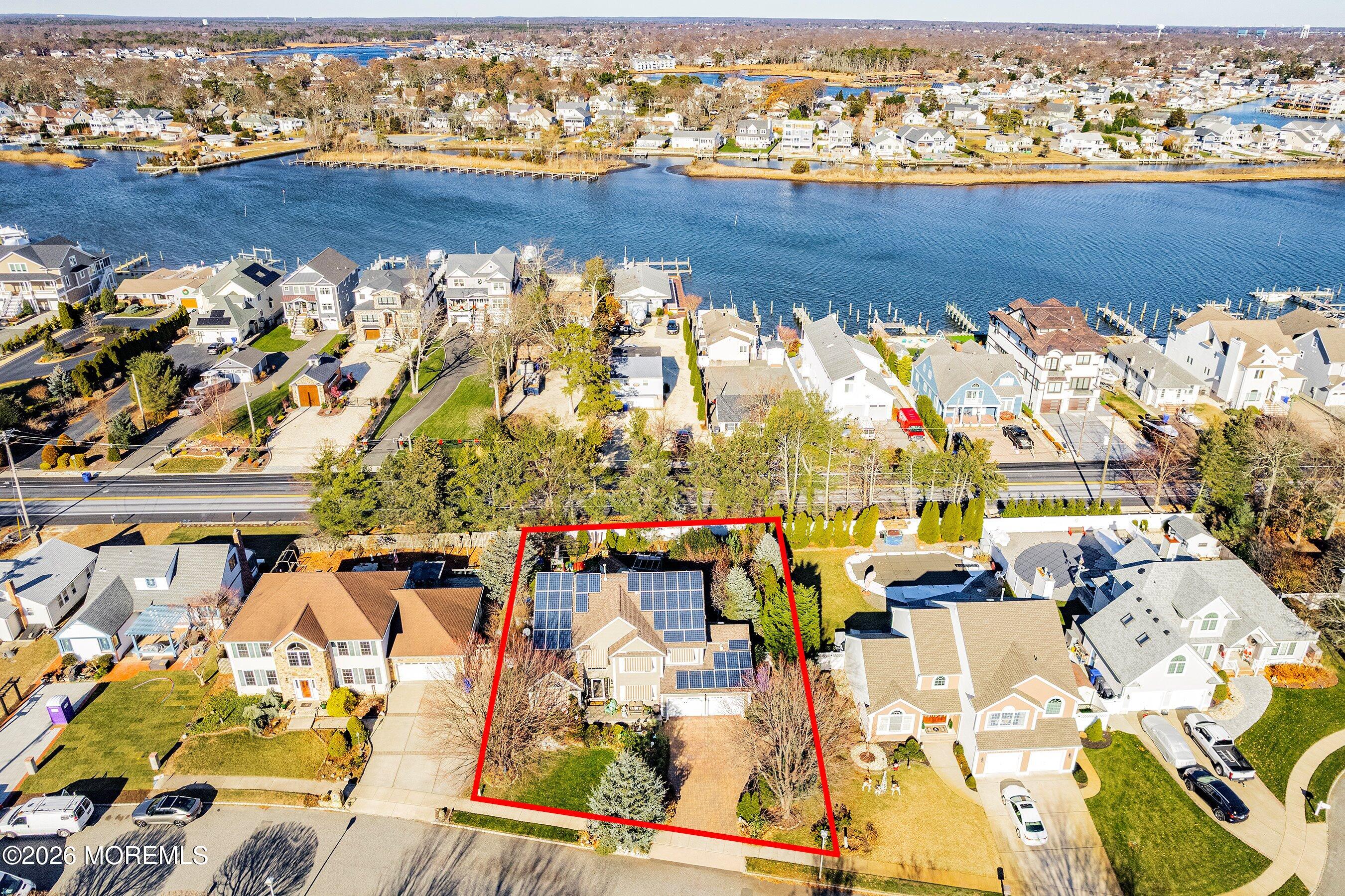 648 Point Avenue Brick, NJ 08724 - Photo 3 of 40 an aerial view of residential houses with outdoor space