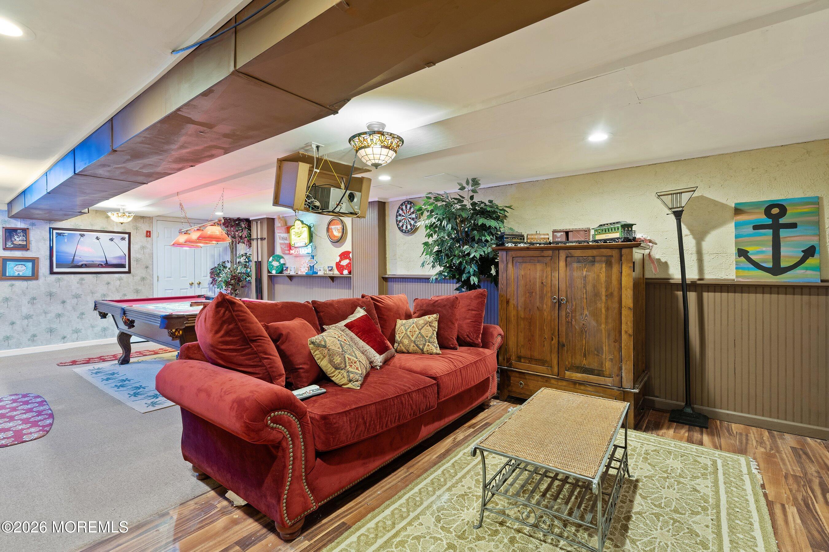 648 Point Avenue Brick, NJ 08724 - Photo 31 of 40 a living room with furniture and a rug