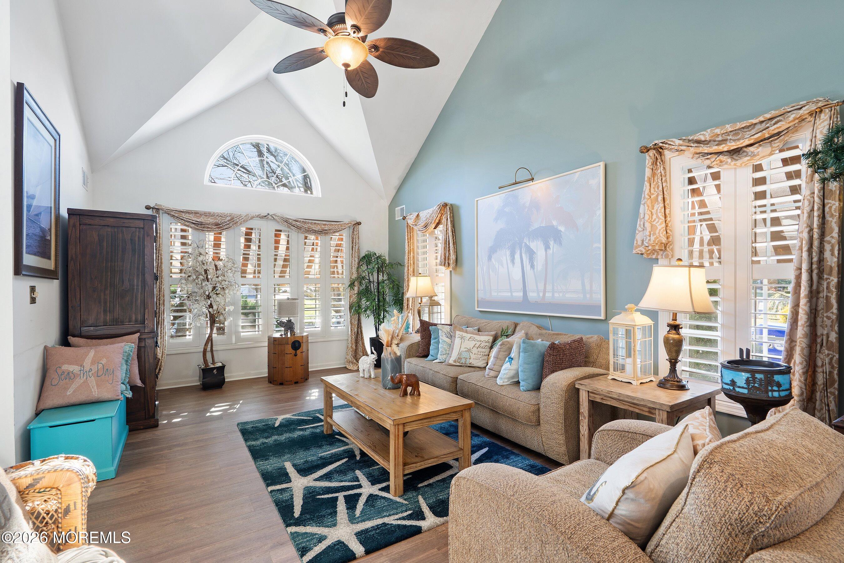 648 Point Avenue Brick, NJ 08724 - Photo 6 of 40 a living room with furniture large window and a flat screen tv