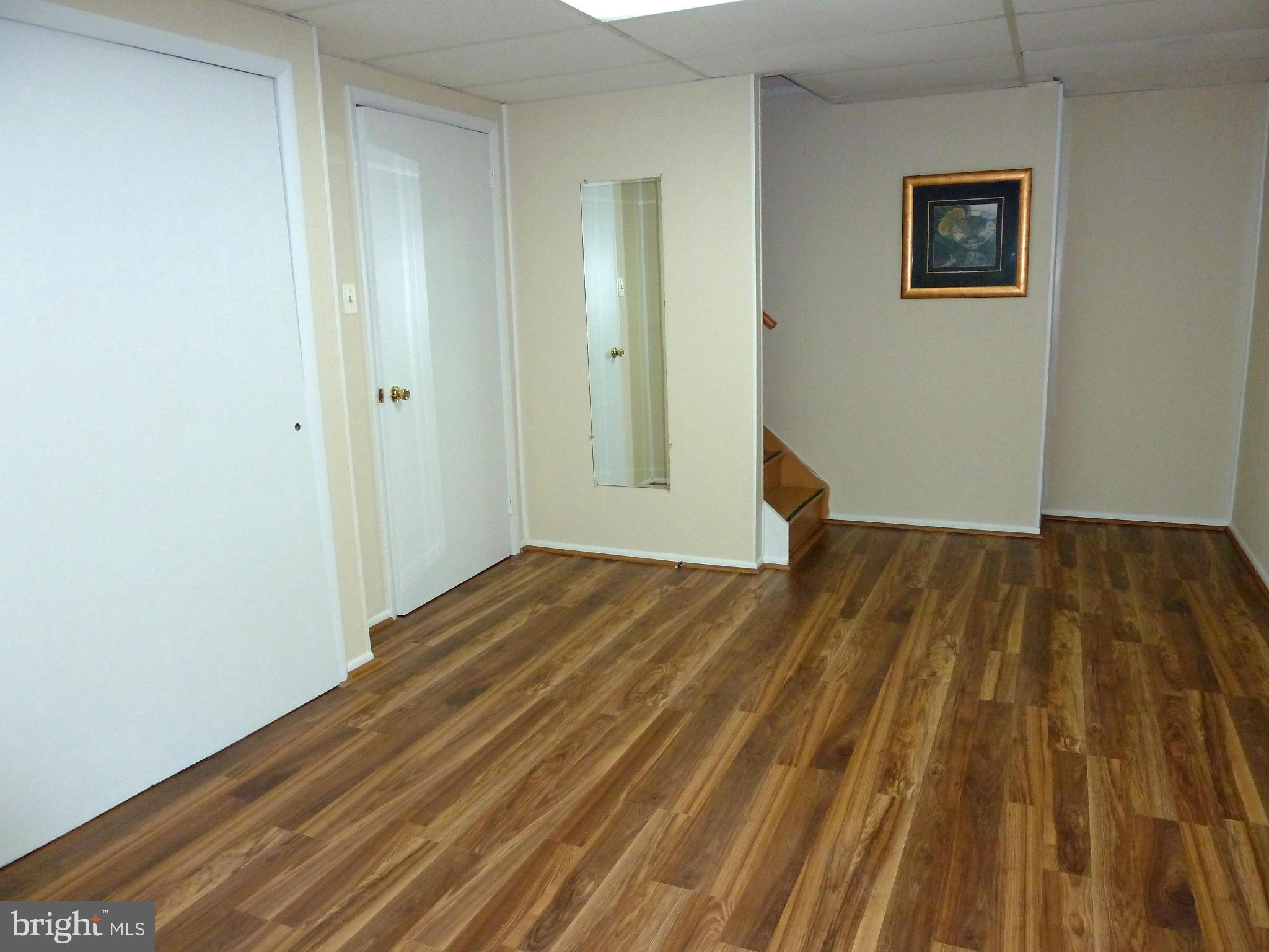 4254 Briars Road Olney, MD 20832 - Photo 23 of 30 Rec Rm: New Hi Quality Wood Laminate