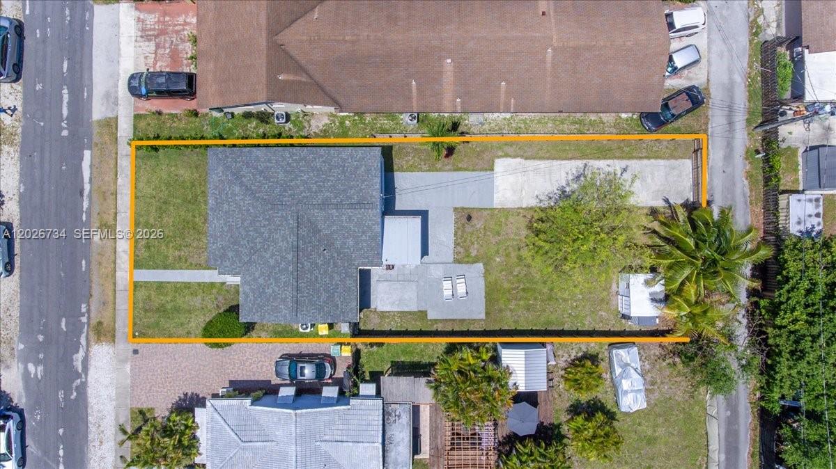 266 Southwest 6th Street Dania Beach, FL 33004 - Photo 3 of 37 an aerial view of a house with a swimming pool
