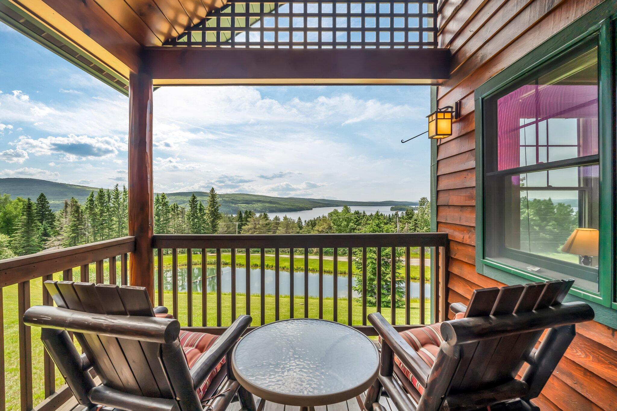 11 Whip Willow Farm Road, Unit 3 Rangeley, ME 04970 - Photo 42 of 60 Covered Porch Overlooking Rangeley Lake