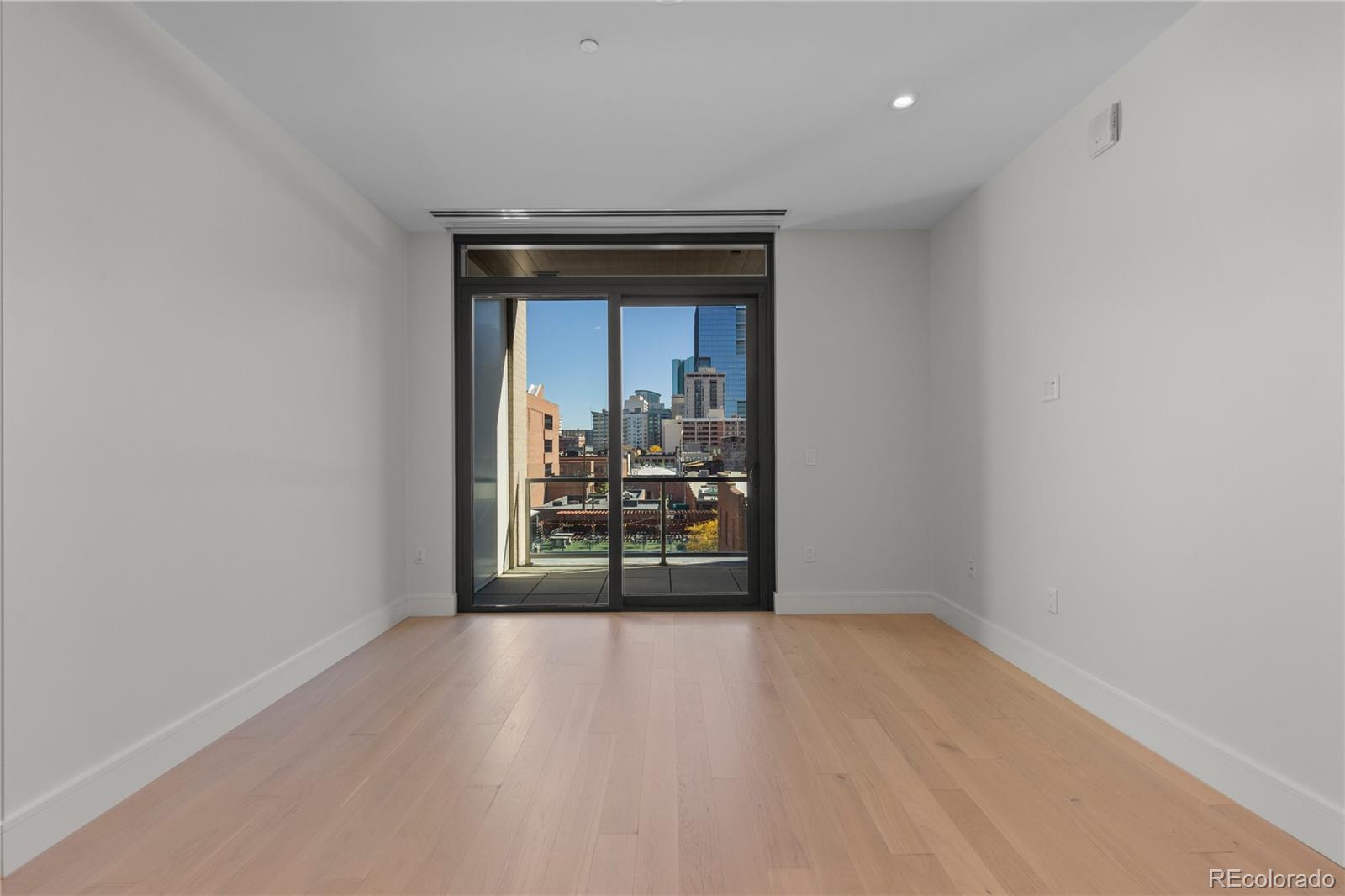 1901 Wazee Street, Unit 507 Denver, CO 80202 - Photo 15 of 45 a view of a room with wooden floor