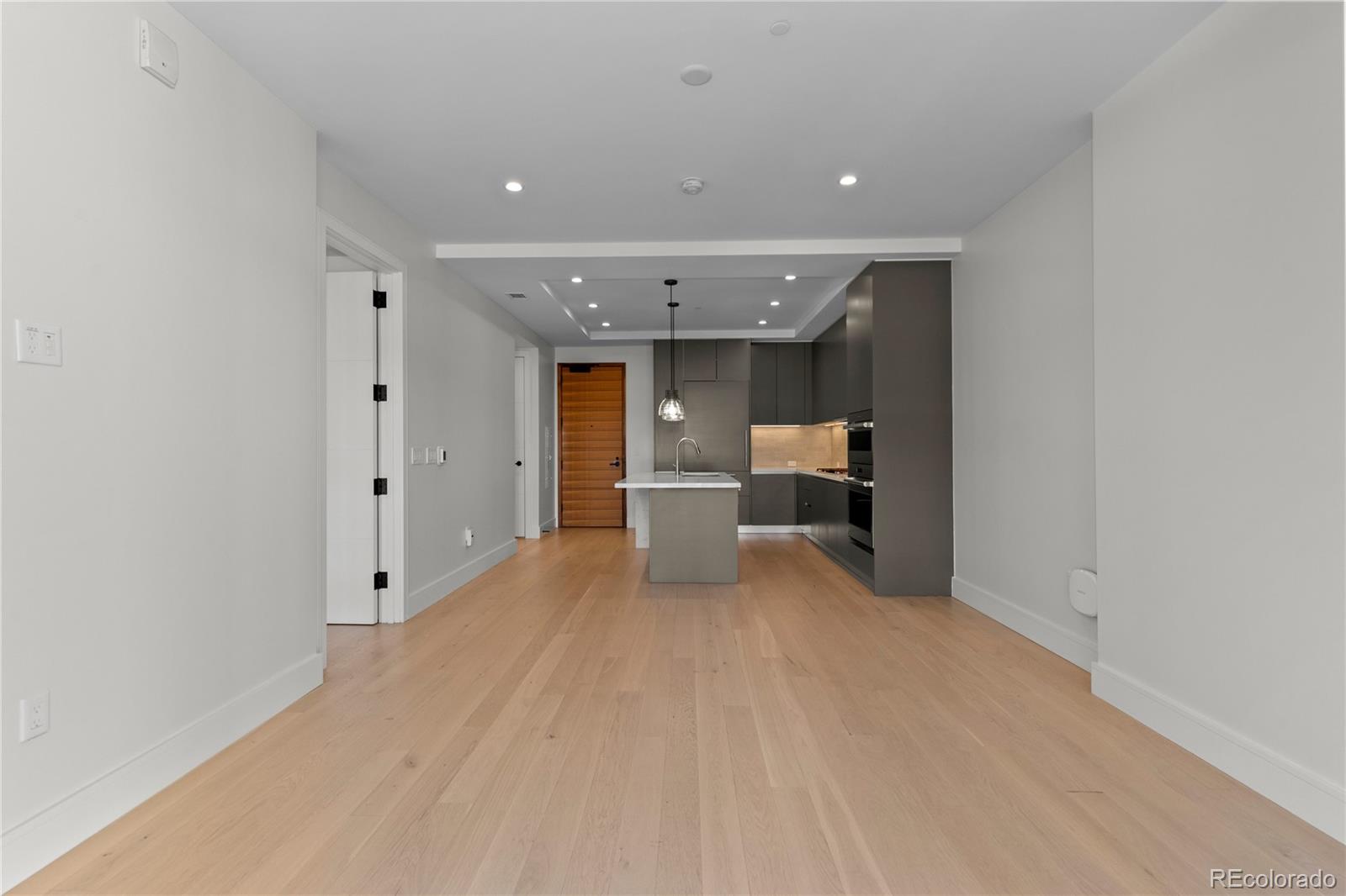 1901 Wazee Street, Unit 507 Denver, CO 80202 - Photo 16 of 45 a view of a kitchen with a sink and cabinets
