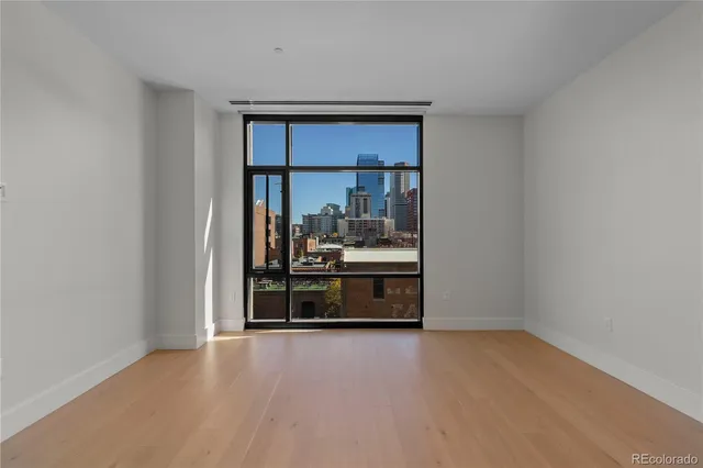 a view of a room that has a bed