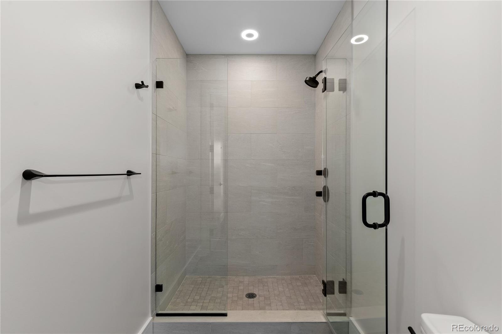 1901 Wazee Street, Unit 507 Denver, CO 80202 - Photo 23 of 45 a bathroom with a shower
