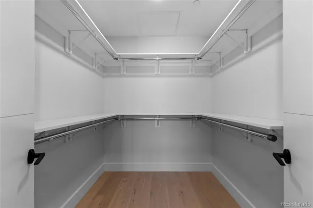 a view of a room with racks on the wall