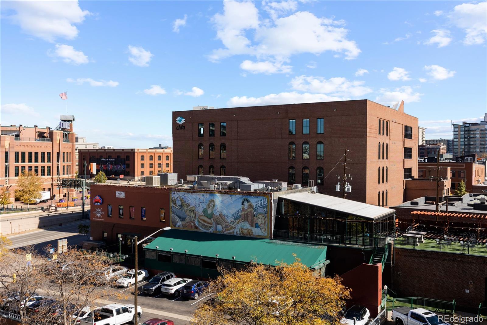1901 Wazee Street, Unit 507 Denver, CO 80202 - Photo 27 of 45 a city view with tall buildings and a yard