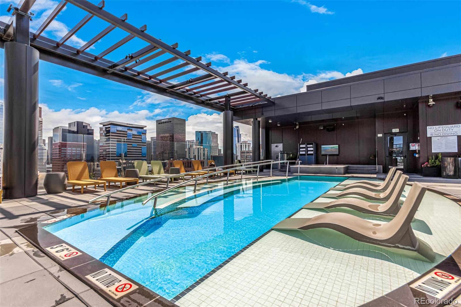 1901 Wazee Street, Unit 507 Denver, CO 80202 - Photo 5 of 45 a view of a living room and kitchen